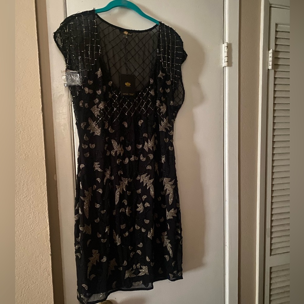 NWT $795 LOTUS THREADS BLACK KNEE LENGTH DRESS. SIZE 10.  Tag is 12  runs small